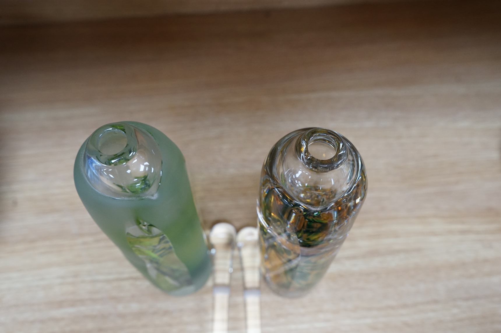 Jane Charles, two oversized art glass scent bottles and stoppers, signed to the bases, 29cm high